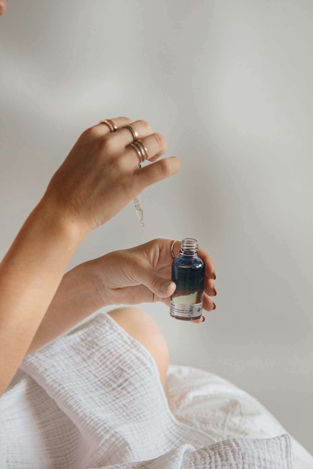 Macro detail of luminous skin and serum